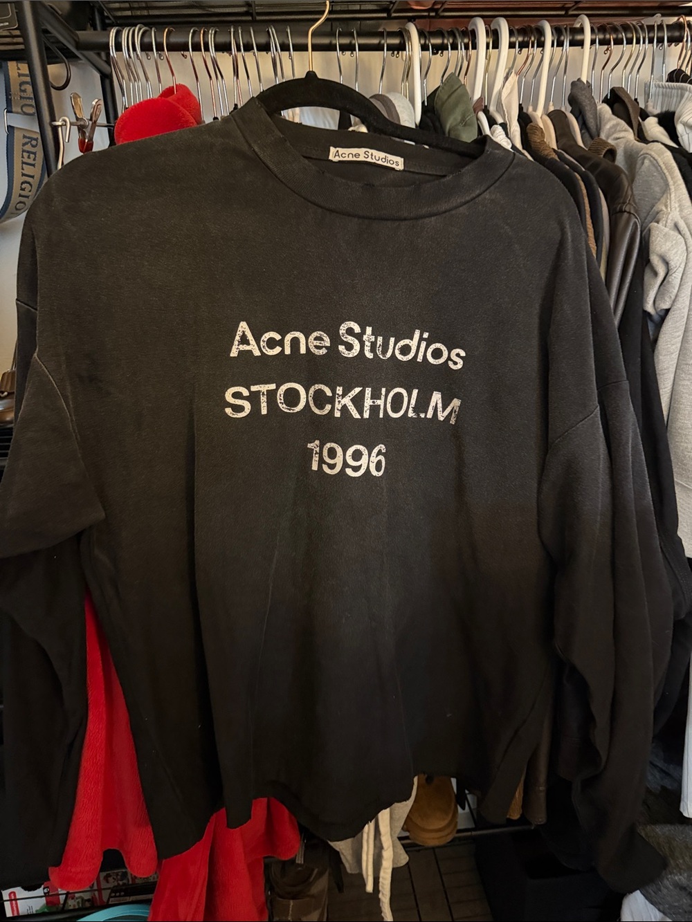 Acne black and white branded garment tag